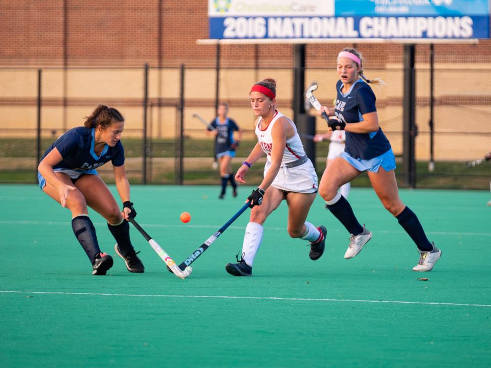 Smyrna's Dru Moffett tries to poke the ball through the Cape Henlopen defense during the DIAA Division I Field Hockey Tournament championship game on Nov. 11. Moffett has been named the Division I Player of the Year.