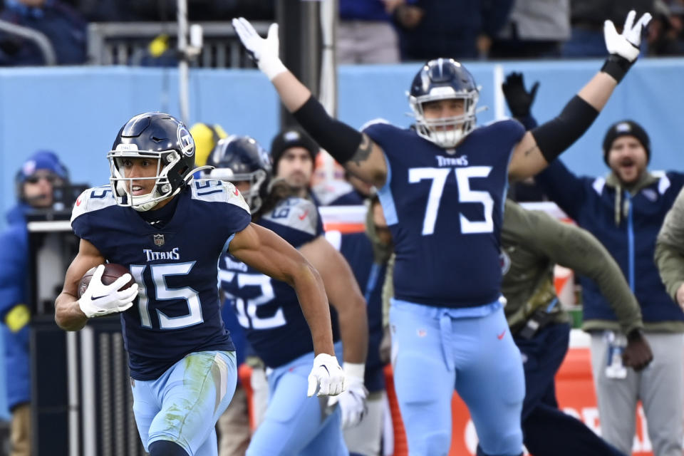 Tennessee Titans wide receiver Nick Westbrook-Ikhine (15) runs after a catch for a touchdown against the Denver Broncos during the second half of an NFL football game, Sunday, Nov. 13, 2022, in Nashville, Tenn. (AP Photo/Mark Zaleski)