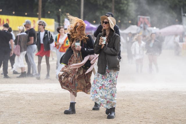 People in windy conditions during the Leeds Festival 2024 at Bramham Park 