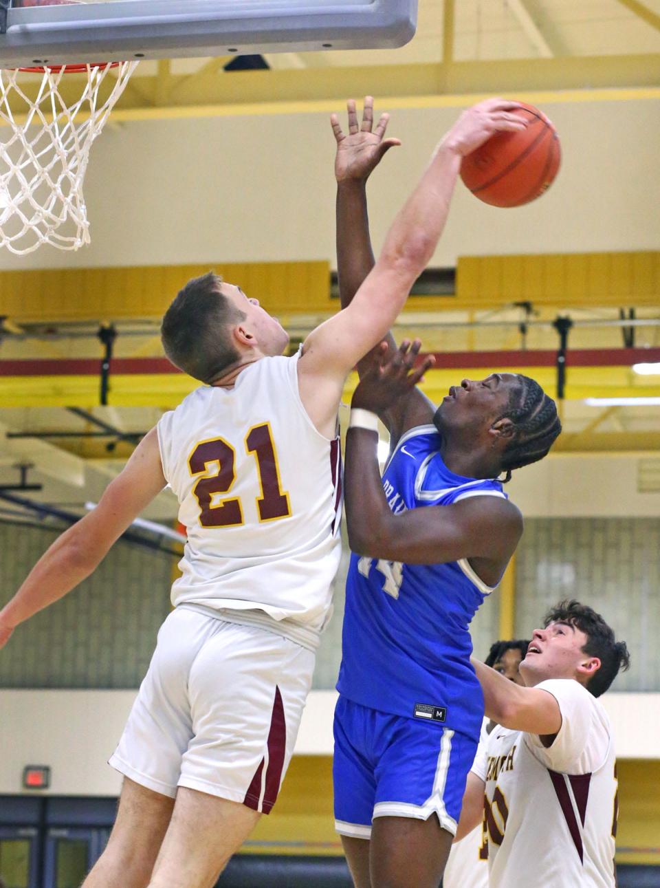 Wildcat forward Will Savage blocks a shot by Wamp forward Ethan Elie.

Weymouth hosts Braintree in their Christmas basketball tournament finale on Friday Dec. 29, 2023