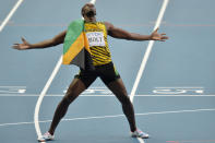 FILE - In this Aug. 17, 2013, file photo, Jamaica's Usain Bolt celebrates winning gold in the men's 200-meter final at the World Athletics Championships in Moscow, Russia. The most promising signal that track and field remains in good hands even after Usain Bolt’s retirement comes from a 22-year-old American named Noah Lyles who appreciates the Jamaican superstar more for what he did after his races than during them. When Lyles spends time studying Bolt on video, he looks not at the lanky speedster’s form in between the lines, but at the dancing, rollicking post-race celebrations Bolt concocted to make his sport can’t-miss viewing whenever he was on the track.(AP Photo/Martin Meissner, File)