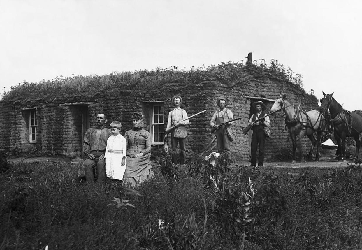 <span class="caption">A family poses in front of their sod house in Custer County, Neb., in 1887.</span> <span class="attribution"><a class="link " href="https://www.gettyimages.com/detail/news-photo/laforge-sod-house-home-south-of-west-union-custer-county-news-photo/514882604?adppopup=true" rel="nofollow noopener" target="_blank" data-ylk="slk:Bettmann/Bettmann via Getty Images;elm:context_link;itc:0;sec:content-canvas">Bettmann/Bettmann via Getty Images</a></span>