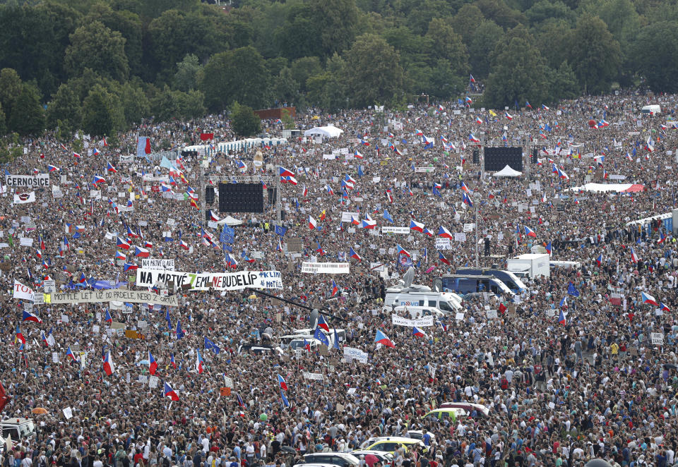 People join a protest demanding the resignation of the Czech Prime Minister Andrej Babis in Prague, Czech Republic, Sunday, June 23, 2019. Protesters are calling on Czech Prime Minister Andrej Babis to step down over fraud allegations and subsidies paid to his former companies. (AP Photo/Petr David Josek)