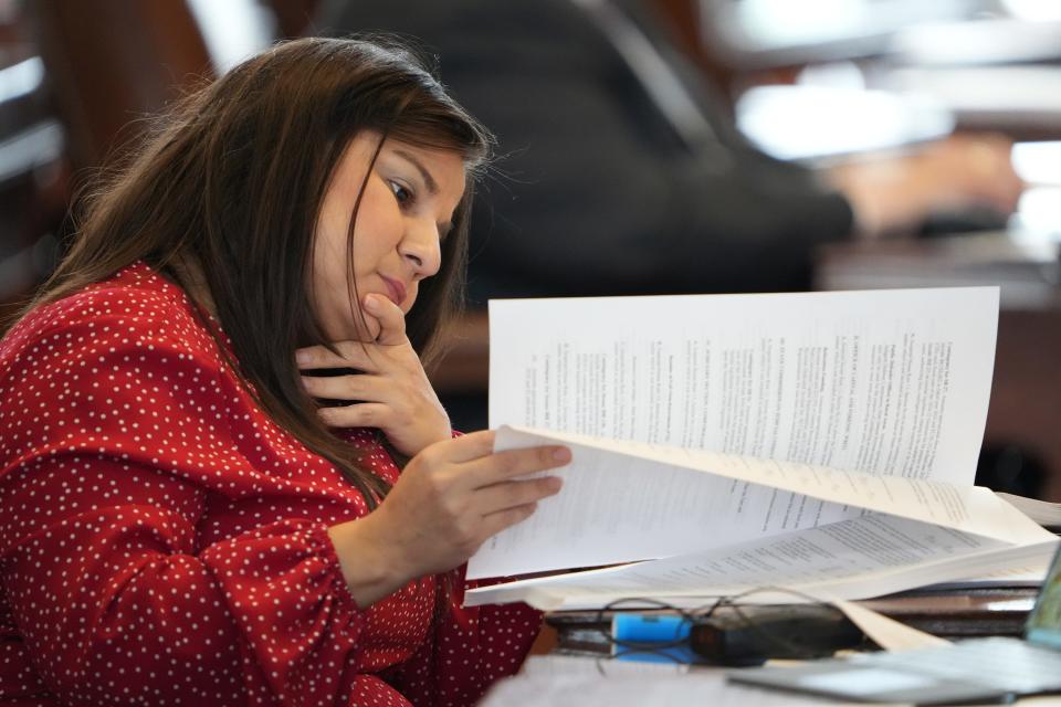 Rep. Janie Lopez, R-San Benito, examines the state budget Thursday.