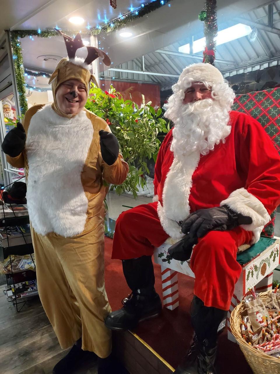 Santa and his reindeer arrive at the 2022 "Candles in the Canyon" holiday celebration in downtown Dunsmuir.