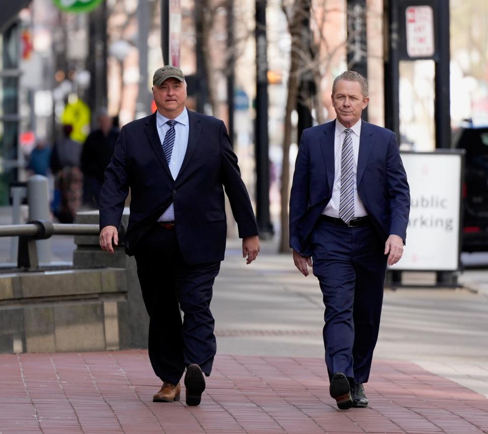 Former Ohio House Speaker Larry Householder, left, heads into the Potter Stewart U.S. Courthouse in downtown Cincinnati Thursday, March 9, 2023, as a verdict has been reached in his trial along with ex-Ohio Republican Party Chairman Matt Borges. Both Householder and Borges were charged with a single count of racketeering conspiracy.