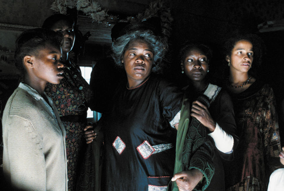 Akosua Busia, Oprah Winfrey, Whoopi Goldberg, and Rae Dawn Chong in The Color Purple