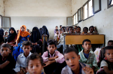 Students attend a class at a school where Afaf Hussein, 10, who is malnourished, used to study near her home village of al-Jaraib in northwestern province of Hajjah, Yemen, February 19, 2019. REUTERS/Khaled Abdullah