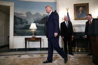 President Donald Trump, left, followed by Vice President Mike Pence and Secretary of State Mike Pompeo, leaves the podium after speaking about the ceasefire in Syria with Turkey, Wednesday, Oct. 23, 2019, in the Diplomatic Room of the White House in Washington. The president was also joined by White House national security adviser Robert O'Brien. (AP Photo/Jacquelyn Martin)