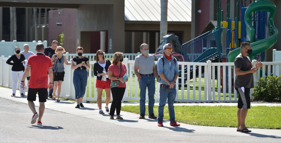 Voters wait to cast their ballots on Election Day 2020 at a polling place inside the Sarasota Baptist Church in Sarasota.