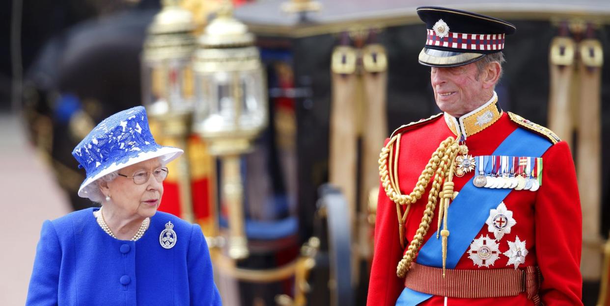 london, united kingdom june 15 embargoed for publication in uk newspapers until 48 hours after create date and time queen elizabeth ii and prince edward, duke of kent stand on a dais outside buckingham palace during the annual trooping the colour ceremony on june 15, 2013 in london, england today's ceremony which marks the queen's official birthday will not be attended by prince philip the duke of edinburgh as he recuperates from abdominal surgery this will also be the duchess of cambridge's last public engagement before her baby is due to be born next month photo by max mumbyindigogetty images