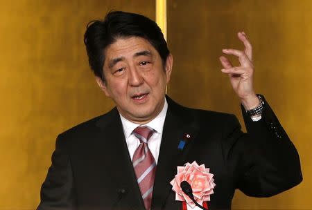 Japan's Prime Minister Shinzo Abe makes a speech in Tokyo January 6, 2015. REUTERS/Toru Hanai