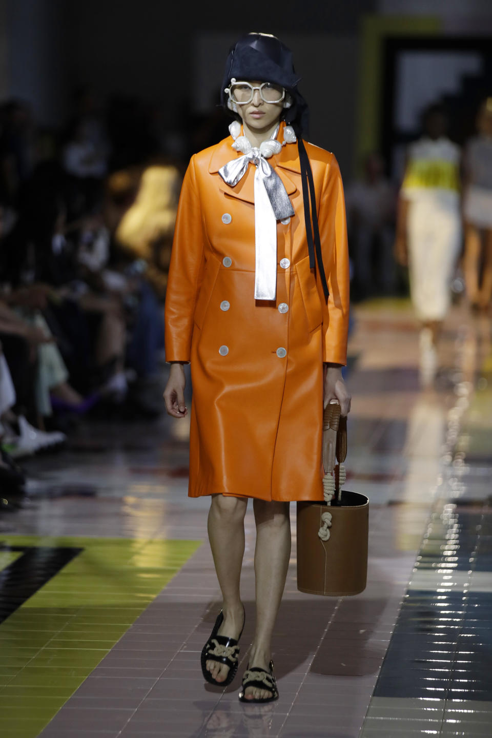 A model wears a creation as part of the Prada Spring-Summer 2020 collection, unveiled during the fashion week, in Milan, Italy, Wednesday, Sept. 18, 2019. (AP Photo/Luca Bruno)