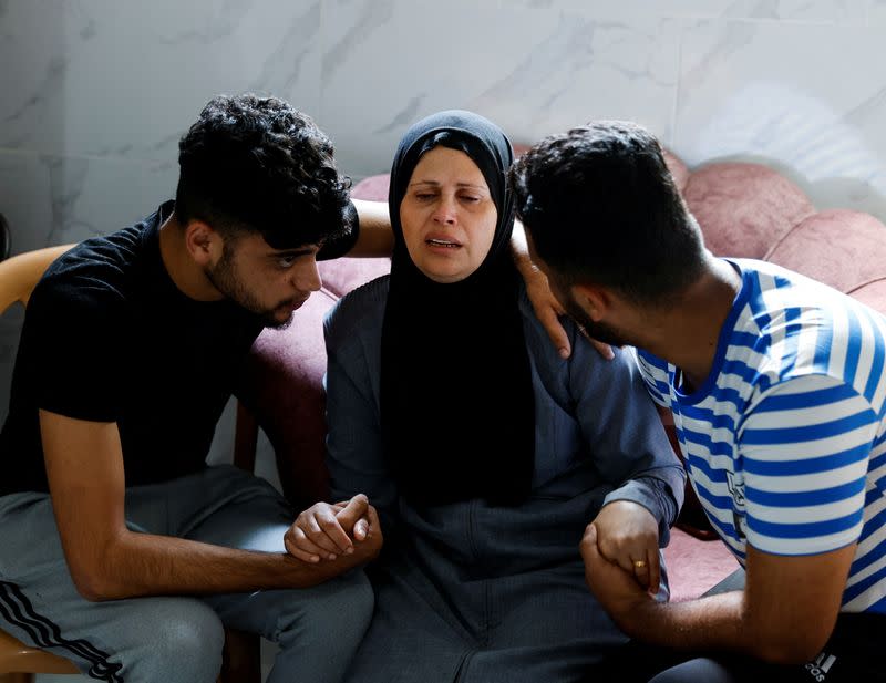 Palestinian mother mourns son killed in a missile strike, in Gaza