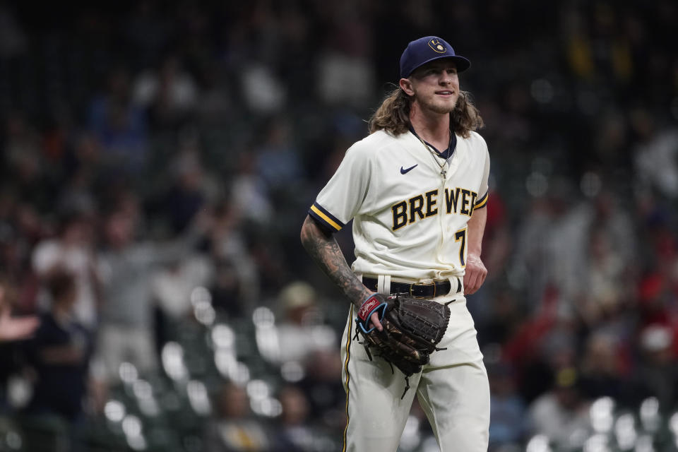 Milwaukee Brewers' Josh Hader walks on the field after giving up a go-ahead home run to Philadelphia Phillies' Matt Vierling during the ninth inning of a baseball game Tuesday, June 7, 2022, in Milwaukee. (AP Photo/Aaron Gash)