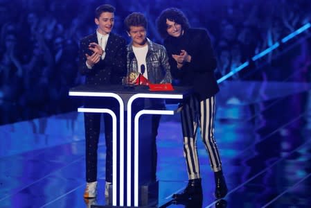 2019 MTV Movie and TV Awards - Noah Schnapp, Gaten Matarazzo, Finn Wolfhard present