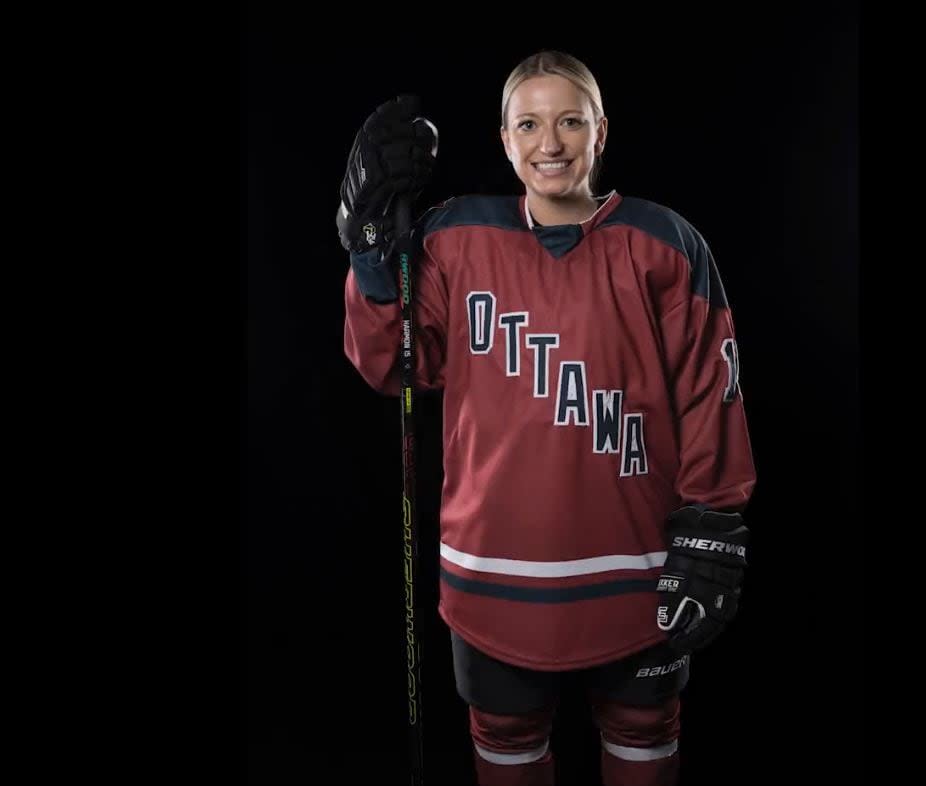 The PWHL unveiled jerseys for its first season on Tuesday. Defender Savannah Harmon is wearing Ottawa's home jersey. (PWHL - image credit)