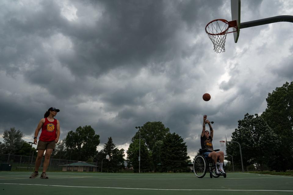 Alison Koziol, left, and Megan Barghols shoot hoops at Lee Martinez Park in Fort Collins on the first official day of summer on Wednesday, June 21, 2023. A half-cent sales tax proposed on the November ballot would pay for maintenance of parks facilities.