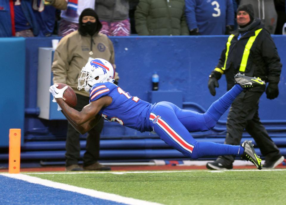 Bills receiver John Brown dives to make the catch for a 42-yard touchdown reception against the Patriots. 