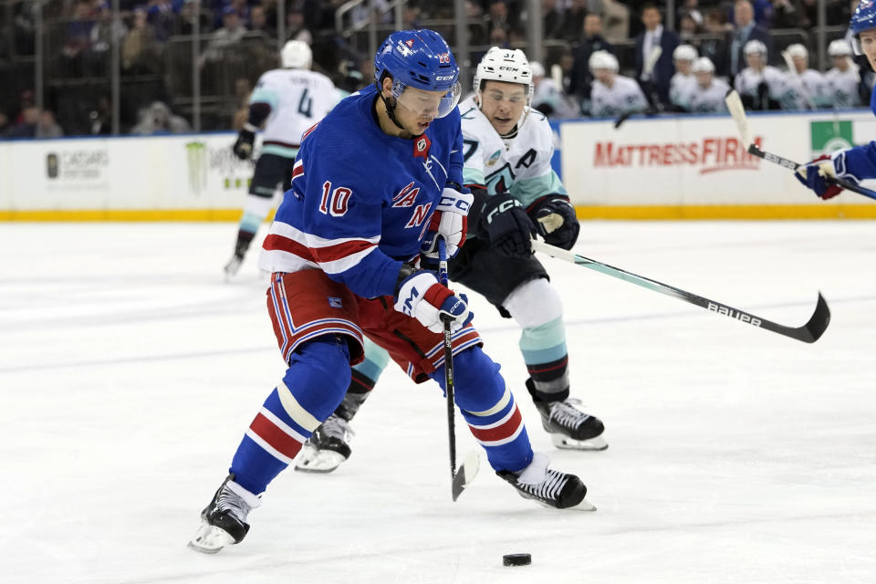 New York Rangers left wing Artemi Panarin (10) skates against Seattle Kraken center Jaden Schwartz (17) during the first period of an NHL hockey game, Tuesday, Jan. 16, 2024, at Madison Square Garden in New York. (AP Photo/Mary Altaffer)