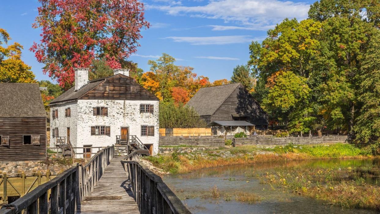 Philipsburg Manor, Blue Sky and Trees in Autumn Colors (Foliage) in Sleepy Hollow, Hudson Valley, New York.