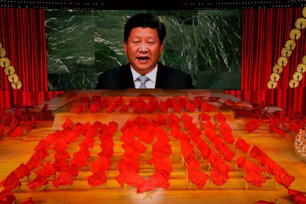 PHOTO: Chinese President Xi Jinping is displayed on a screen as performers dance at a gala show ahead of the 100th anniversary of the founding of the Chinese Communist Party in Beijing on June 28, 2021.  (AP Photo/Ng Han Guan, File)