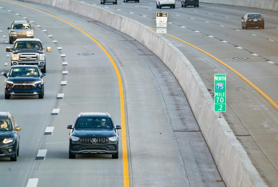 Early morning commuters utilize the new HOV lanes between the hours of 6-9 AM on 75 south through Oakland County on Wednesday, Dec. 20, 2023.