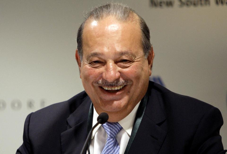 FILE - In this Wednesday, Sept. 29, 2010, file photo, Mexican tycoon Carlos Slim Helu holds a press conference at the Forbes Global CEO conference in Sydney. Forbes, on Monday, March 3, 2014, listed Helu as the world's second richest man. (AP Photo/Jeremy Piper)