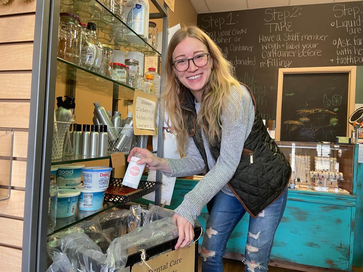 Quartz and Company owner Lexie Jones show a recycling/reuse station at her downtown Howell shop, Wednesday, March 13, 2024.