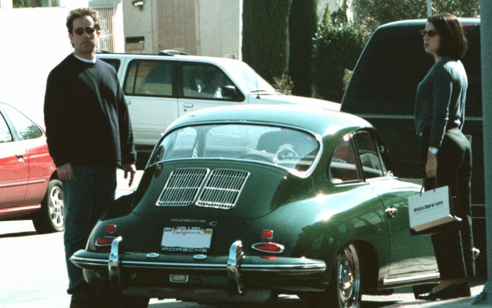 Jerry Seinfeld with one of his many classic cars, in 2000