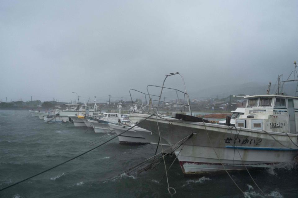 This picture shows moored boats amid strong rain as Typhoon Nanmadol approaches Izumi, Kagoshima prefecture on September 18, 2022.