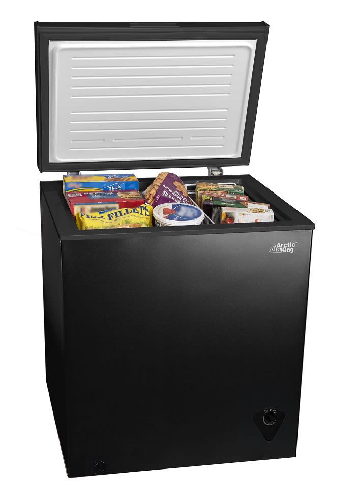 The space-saving design makes it easy to fit this chest freezer anywhere in your garage. (Photo: Walmart)