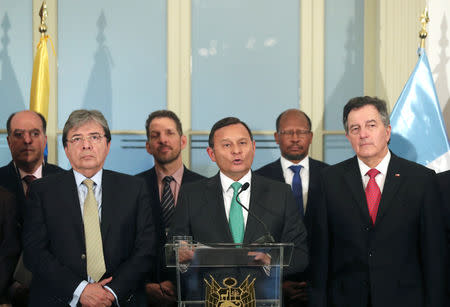 Peru's Foreign Minister Nestor Popolizio makes declarations to the media next to Chile's Foreign Minister Roberto Ampuero and Colombia's Foreign Minister Carlos Holmes Trujillo after a Lima Group regional bloc summit in Lima, Peru May 3, 2019. REUTERS/ Guadalupe Pardo