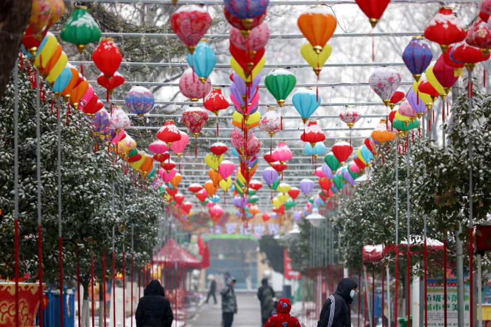 People ventured out in the snow to enjoy lanterns on the 15th day of the first lunar month in Zaozhuang, China, on Feb. 24, 2024. <span class="copyright">Costfoto—Getty Images</span>