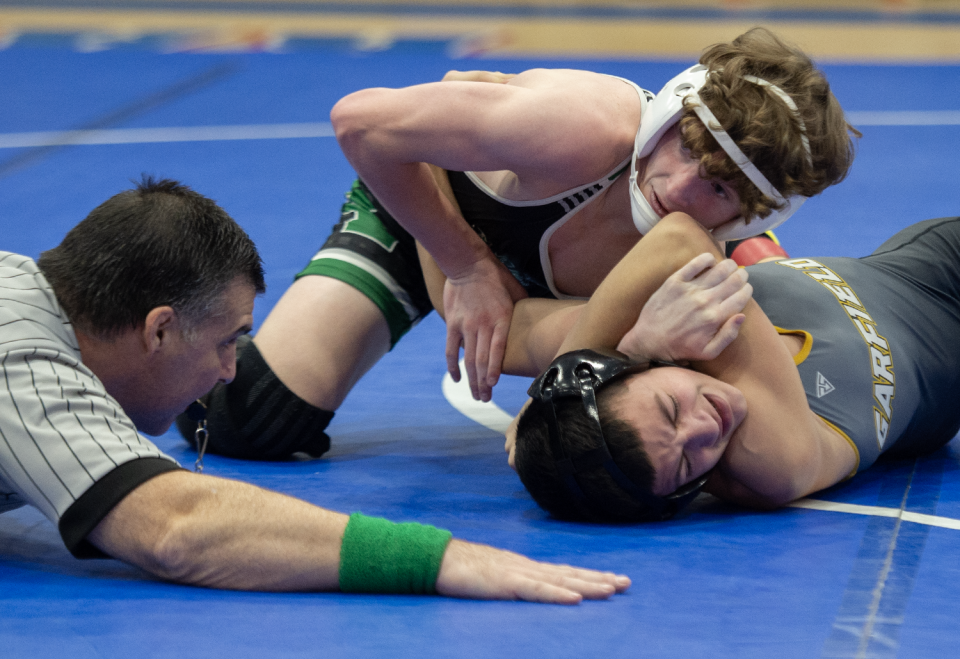 Aurora's Johnny Green wrestles at the Portage County Tournament earlier this year.