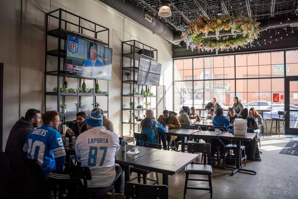 Lions fans pregame inside The Shadow Gallery on Sunday, Jan. 21 2023 in Detroit.