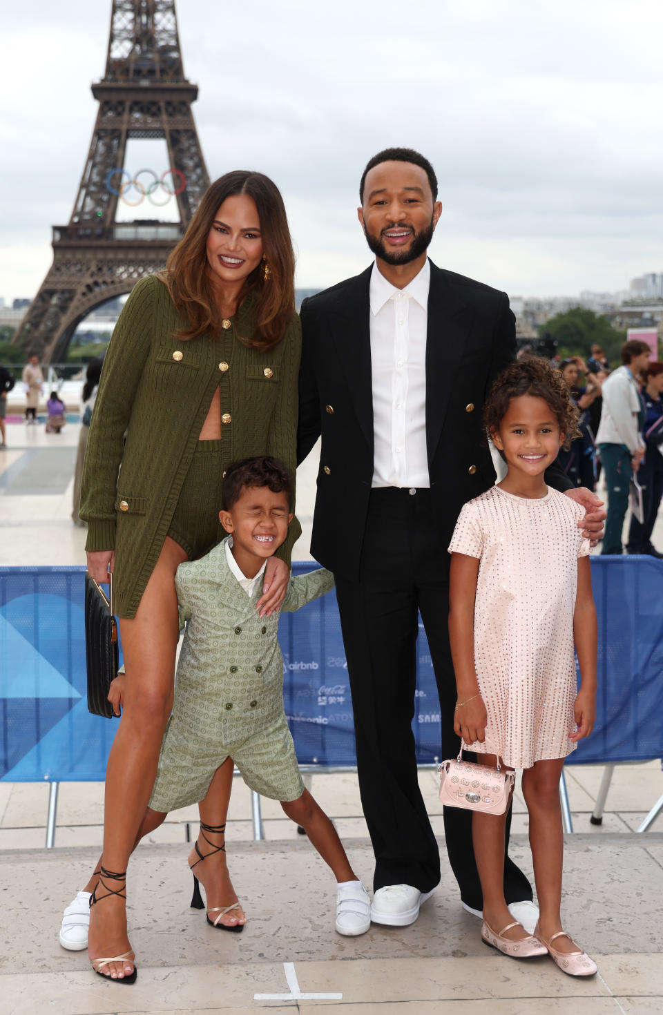 PARIS, FRANCE - JULY 26: Chrissy Teigen and John Legend attend with son Miles and daughter Luna the red carpet ahead of the opening ceremony of the Olympic Games Paris 2024 on July 26, 2024 in Paris, France. (Photo by Matthew Stockman/Getty Images)