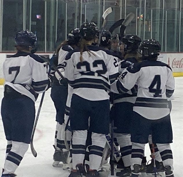 Members of the Exeter High School girls hockey team celebrate after beating No. 11 Concord, 3-1 in a Division I first-round game Tuesday at The Rinks at Exeter. Sixth-seeded Exeter will face No. 3 Bishop Guertin on Friday in a quarterfinal round game at Skate 3 Ice Arena in Tyngsboro, Massachusetts.