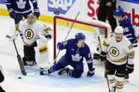 Toronto Maple Leafs' Matthew Knies celebrates his goal on Boston Bruins goaltender Jeremy Swayman with Mitch Marner during the second period of action in Game 3 of an NHL hockey Stanley Cup first-round playoff series in Toronto on Wednesday, April 24, 2024. (Frank Gunn/The Canadian Press via AP)