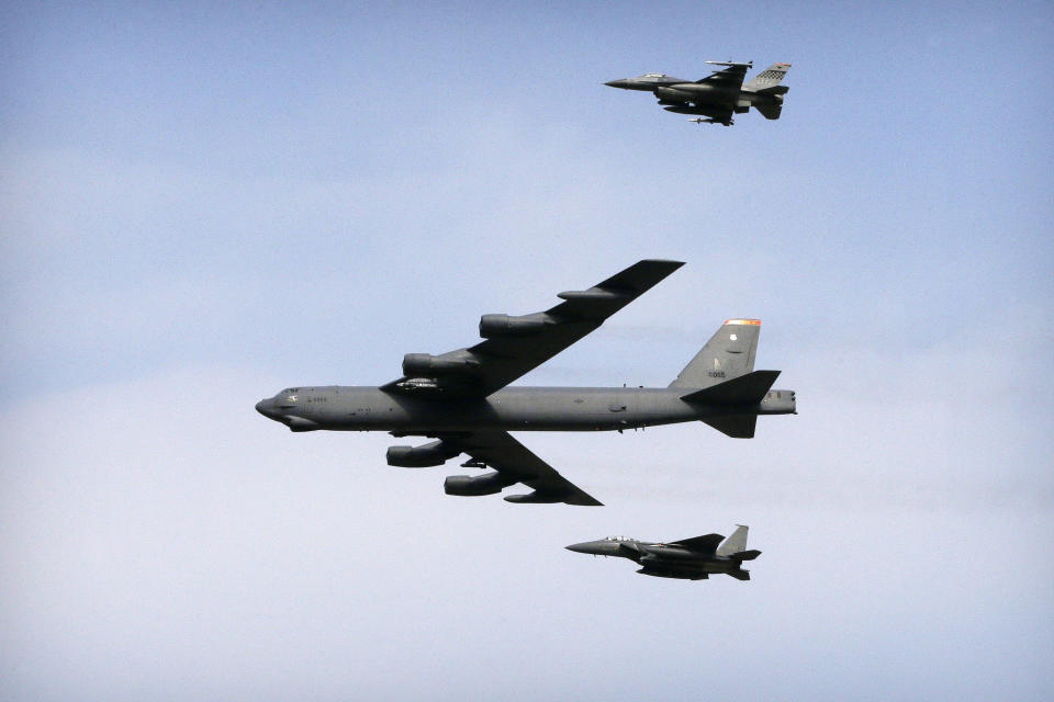 FILE - A U.S. Air Force B-52 bomber flies over Osan Air Base in Pyeongtaek, South Korea, Jan 10, 2016. The Australian defense minister on Wednesday, Nov. 2, 2022 played down the significance of a major upgrade of B-52 facilities planned for northern Australia that has raised China’s ire, saying the nuclear-capable U.S. bombers had been visiting since the 1980s. (AP Photo/Ahn Young-joon, File)