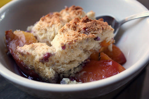 <strong>Get the <a href="http://www.completelydelicious.com/2010/08/dutch-oven-huckleberry-peach-cobbler.html" target="_blank" rel="noopener noreferrer">Dutch oven huckleberry peach cobbler</a> recipe from Completely Delicious.</strong>