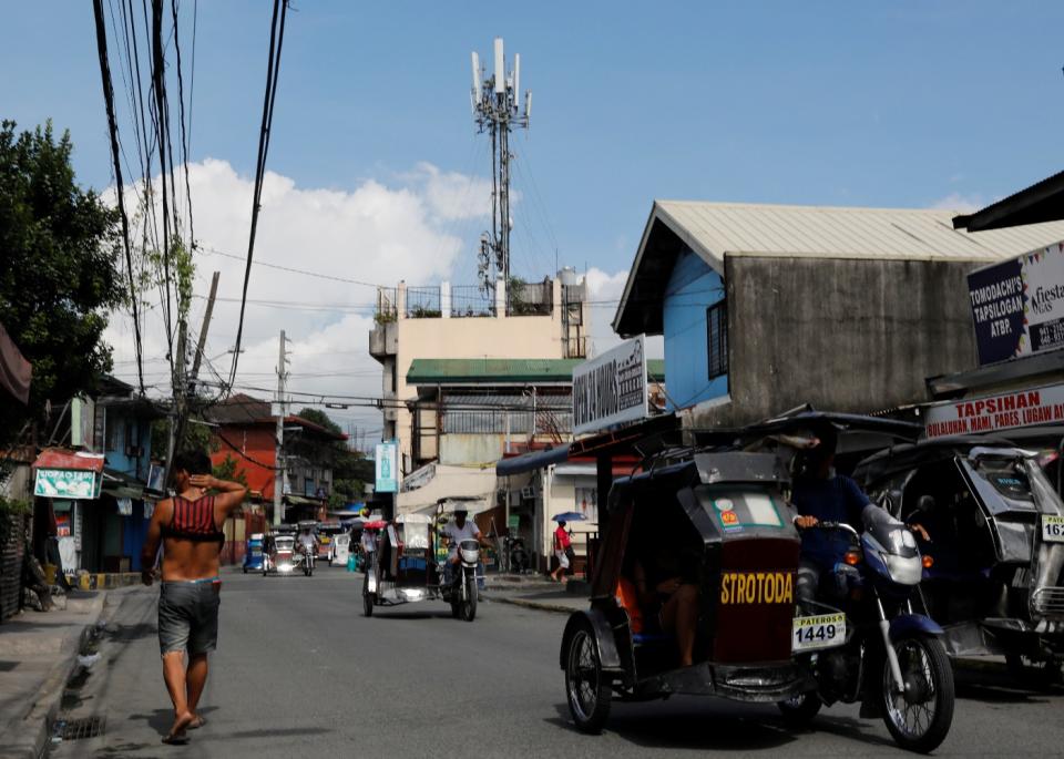 A Globe Telecom tower is pictured on the roof top of a building in Pateros, Metro Manila, Philippines, August 2, 2018. Picture taken August 2, 2018. REUTERS/Erik De Castro