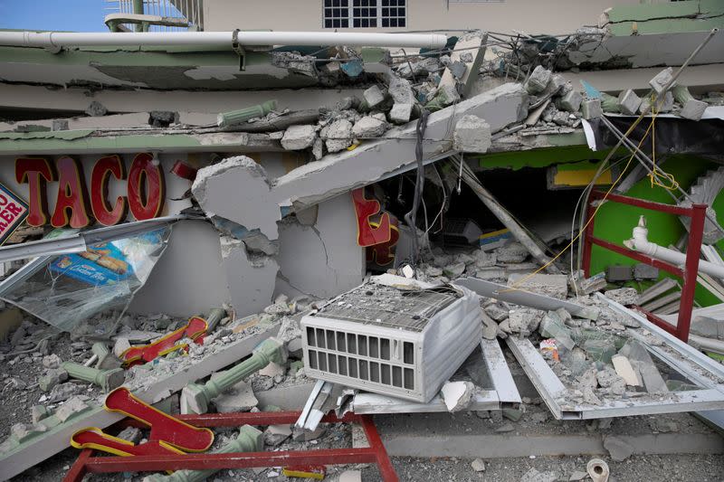 A collapsed shop is seen after an earthquake in Guanica