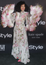 <p>Tracee Ellis Ross wearing a sensational floral number by Giambattista Valli complete with feathered sleeves at the InStyle Awards. <i>[Photo: Getty]</i> </p>