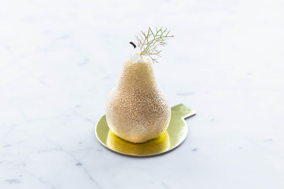 Xmas pear: Pear cardamom mousse with almond jaconde, poached pear + caramel.