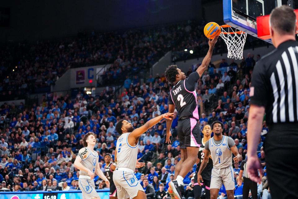 Indiana State's Isaiah Swope goes in for a layup in the Sycamores' win over Drake on Saturday in Terre Haute, Ind.