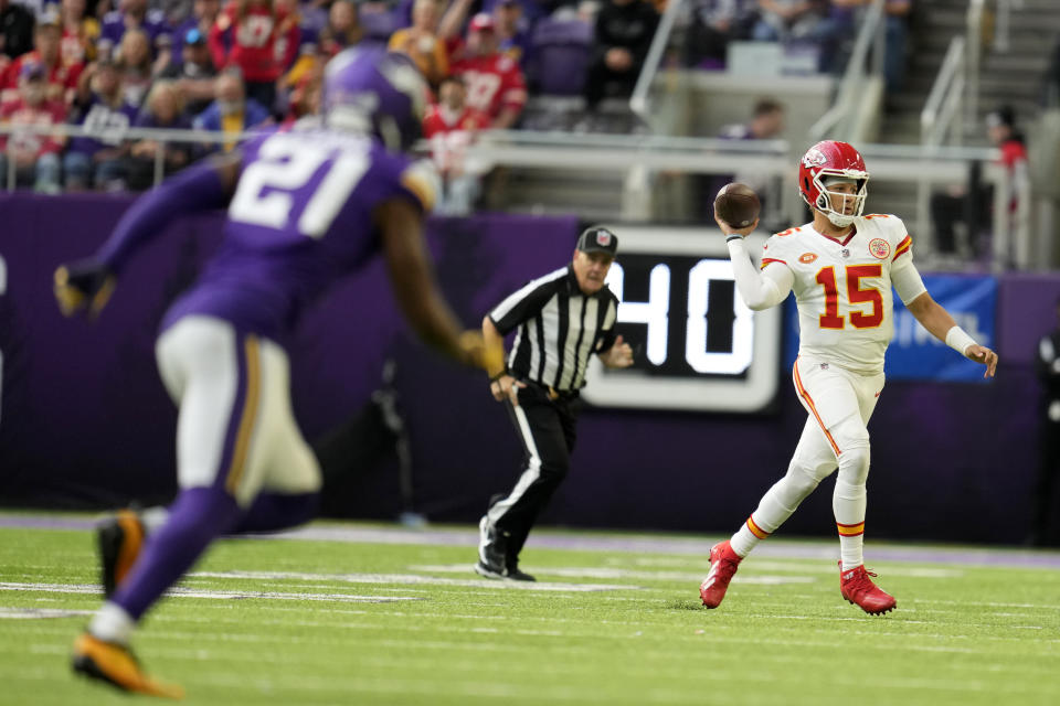 Kansas City Chiefs quarterback Patrick Mahomes (15) throws a pass during the first half of an NFL football game against the Minnesota Vikings, Sunday, Oct. 8, 2023, in Minneapolis. (AP Photo/Abbie Parr)