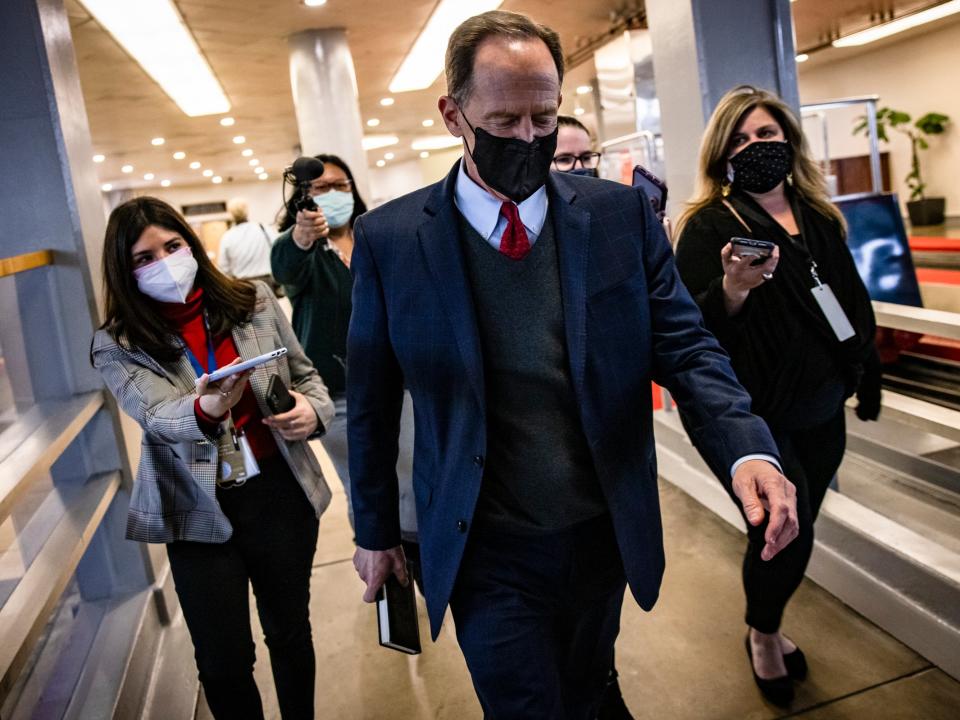 Senator Pat Toomey walks through the Senate subway after the end of Mr Trump’s second impeachment trial on February 13, 2021.  (Getty Images)