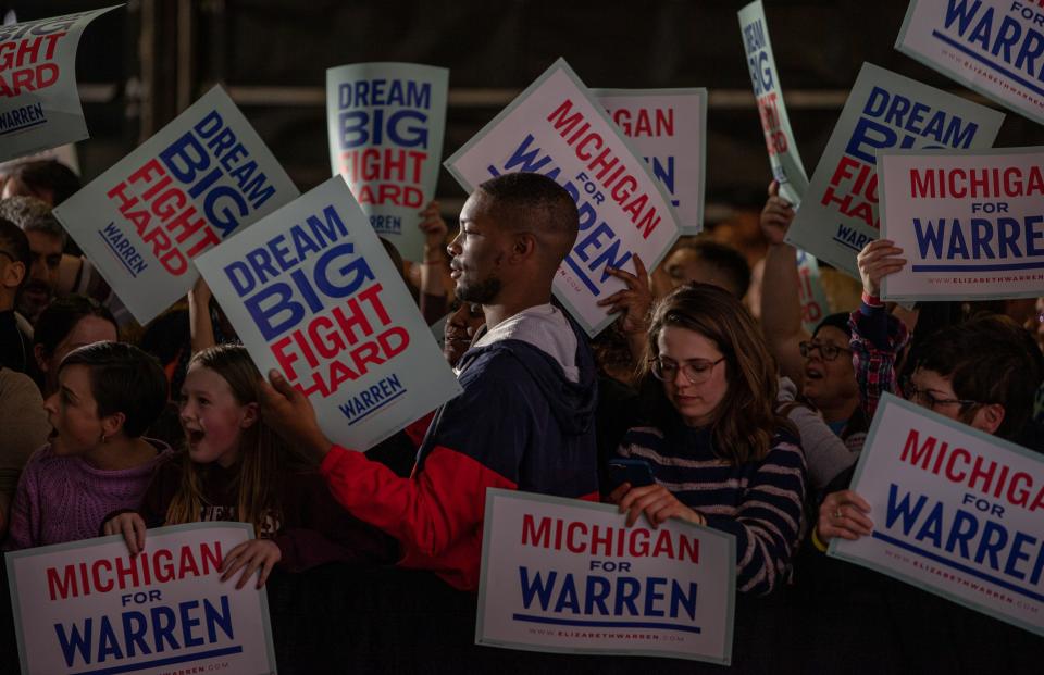 Supporters of Democratic Presidential hopeful Massachusetts Senator Elizabeth Warren attend a rally March 3, 2020 in Detroit, Michigan at the Detroit Kitchen Connect on Super Tuesday. (Photo by SETH HERALD / APF / AFP) (Photo by SETH HERALD/APF/AFP via Getty Images)