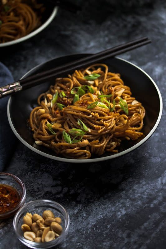 <p>She's Got Chops Kitchen</p><p>Sweet and savory peanut sauce dresses the noodles and is paired with spicy chili crisp for an extra flavor kick.</p><p><strong>Get the recipe here: <a href="https://shesgotchopskitchen.com/peanut-noodles-with-chili-crisp/" rel="nofollow noopener" target="_blank" data-ylk="slk:Peanut Noodles with Chili Crisp;elm:context_link;itc:0;sec:content-canvas" class="link ">Peanut Noodles with Chili Crisp</a></strong></p>